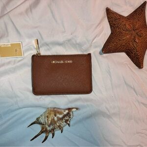 MK leather coin purse. NWT.
